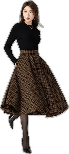 Fall Asymmetrical Pleated Skirt, Fall Pleated Asymmetrical Skirt, Brown Long Skirt For Winter, Brown Asymmetrical Skirt For Fall, Brown Long Skirt Bottoms For Winter, Winter Asymmetrical Mini Skirt, Full Fall Skirt With Lined Detail, Winter Flared Gathered Skirt, Full Fall Skirt With Lining