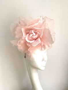 Large soft pink flower hat This amazing large pink flower hat is made from organza and velvet fabric. The hat sits on the black 10cm sinamay base which is attached to a fabric-covered headband and a comb so it will sit steadily on your hair. A large Pink flower hat will be an amazing accessory to compliment your outfit. It will fit the average head size. You can wear this amazing hat at weddings, Christenings, Horse races, and any other special occasion. Enjoy and please have a look in my shop f Whimsical Pink Headpiece With Handmade Flowers, Pink Feminine Fascinator For Royal Ascot, Pink Feminine Fascinator For Kentucky Derby, Pink Pinched Crown Headpiece For Races, Pink Flower Fascinator For Wedding, Pink Feminine Fascinator For Wedding, Pink Handmade Flower Headpieces For Royal Ascot, Pink Headpieces With Handmade Flowers For Royal Ascot, Pink Handmade Flowers Fascinator For Evening