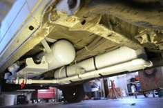 the underside of a vehicle in a garage