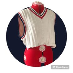 Gorgeous knit cropped sweater vest. Colors are red, white, and blue. Will best fit sizes S/M. Perfect for layering or just by itself.