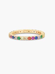 Rainbows have so many different meanings, but the most popular one is that of hope - this ring can carry the symbol of your choosing.Eternity bands are the most timeless pieces you can have! It's perfect for stacking with all your other rings for a more fashionable and trendy look while adding just enough sparkle. The ring is encrusted with 1.7mm cubic zirconias in a rainbow pattern that wrap around the entire band. It is composed of gold or rhodium plated brass. Total thickness of the ring, inc Stackable Multicolor Jewelry, Adjustable Halo Stackable Rings, Stackable Eternity Band For Promise, Adjustable Eternity Band In Fine Jewelry Style, Adjustable Round Stackable Eternity Band, Adjustable Stackable Round Eternity Band, Stackable Fine Jewelry Eternity Band For Promise, Fine Jewelry Stackable Eternity Band For Promise, Infinity Stackable Promise Rings