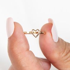 14k Heart Ring | Solid Gold Ring | Stacking Ring | Gold Dainty Ring | Gold Heart Ring | Gold Pinky Ring | Minimalist Ring | Valentines Gift ➔ Made to Order ➔ Gold Karat: 14K gold ➔ Band Width: 1.5mm (Please note that due to variations in computer/phone screens and the natural stones we use, the color of stones may vary) This ring is made to order, please allow 3-10 business days before shipping. Want it sooner? Ask us and we will let you know if it's possible! ♦︎ Check out more about our shop at: https://etsy.me/3qqqait ♦︎ Any Questions or Comments? Contact us Below: https://etsy.me/3twDq7a Go direct to our categories: Diamond Rings: https://etsy.me/4adgGMQ Diamond Earrings: https://etsy.me/41ldoTQ Diamond Necklaces: https://etsy.me/3TjKqBD Diamond Wedding Bands: https://etsy.me/3uSyCw5 Ru Heart Ring Gold, Gold Dainty Ring, Gold Ring Stacking, Gold Pinky Ring, Gold Heart Ring, Dainty Gold Rings, Diamond Necklaces, Solid Gold Ring, Phone Screens