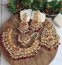 Nauratan Bridal set in Maroon color  Earrings  Tika Necklace  Jhumer Color Earrings, Pakistani Jewelry, Color Stone, Maroon Color, Bridal Set, Multi Stone, Bridal Sets, Elegant Fashion, Wedding Events