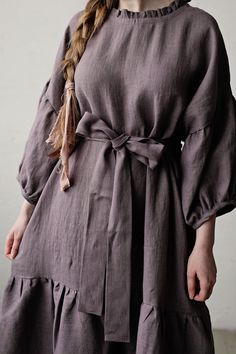 This oversized dress is made from 100% soft and washed linen. Details: - Composition: 100% Oeko-Tex certified linen - Colour: mauve - Dropped shoulders - Linen belt - Ruffle skirt and neckline - Size: One size - fits all - Medium weight linen - Linen care: machine wash gentle; tumble dry low, ironing optional - The price is for one dress, other pictured items are not included Measurements: Length (from neck down) - 125 cm (49,2 in) Chest width - 140 cm (55,1 in) Sleeve length (from collar) - 60 Relaxed Fit Linen Ruffle Dress, Relaxed Fit Linen Dress With Ruffles, Flowy Linen Dress For Brunch, Victorian Aprons, Plus Size Linen Dress, Linen Belt, Victorian Maid, Pink Linen Dress, Kimono Style Dress