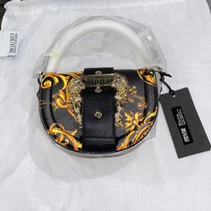 See Picture For Details. Condition: Brand New, With Tag, Comes With Dust Bag Imperfections: None Designer Bags With Gold-tone Hardware, Black Bag With Gold-tone Hardware, Black Bags With Gold-tone Hardware For Fashion, Versace Jeans Couture Bag, Couture Bags, Versace Jeans Couture, Versace Jeans, Versace, Gold Color