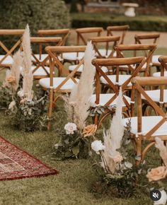 an outdoor ceremony with chairs and flowers