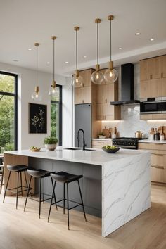 a modern kitchen with marble counter tops and stools in front of an island that's surrounded by wooden cabinets