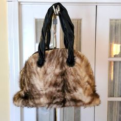 Beautiful Paolo Masi Handbag. Genuine Mink. Double Twisted Handles. Interior Backwall Zip Pocket And Accessories Pocket. Leather Bottom Panel. 5 Gold Feet For Added Protection. Brand New Comes In Original Paolo Masi Drawstring Bag. Elegant Rectangular Shoulder Bag With Faux Fur Lining, Chic Evening Shoulder Bag With Faux Fur Lining, Chic Shoulder Bag With Faux Fur Lining For Shopping, Chic Travel Shoulder Bag With Faux Fur Lining, Elegant Evening Shoulder Bag With Faux Fur Lining, Elegant Evening Bags With Faux Fur Lining, Everyday Top Handle Shoulder Bag With Faux Fur Lining, Evening Rectangular Bag With Faux Fur Lining, Shopping Bags With Faux Fur Lining