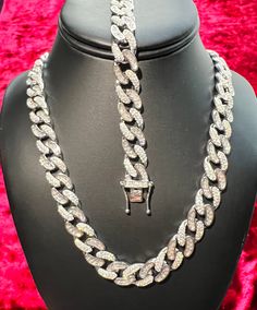 "925 sterling silver AAA CZ, iced out, all bling,  cuban baguette chain. Length of the chain is 24\"   and size is 12mm.  matching bracelet is 8.5\" in length  please be gentle and take care of your jewelry as it's made with love.  Every effort is made to show the item as it appears to the eye but items may be bigger or smaller depending on the way they were photographed.Please read the measurements under each listing and message me for any questions.Thanks" Silver Chain Link Jewelry For Streetwear, Cuban Link Silver Chain With Cubic Zirconia, Iced White Gold Cuban Link Jewelry, Luxury Iced Out Chain Link Jewelry, Silver Cuban Link Necklace With Bling, Diamond Cuban Link Necklace With Bling, Silver Diamond Cuban Link Necklace With Bling, Silver Cuban Link Necklace With Diamond Accents For Gift, Silver Curb Chain Jewelry For Streetwear