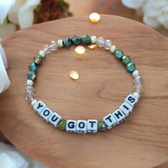 This listing is for 1 (One) "You Got This" Word/Phrase Beaded Bracelet.  ** Each bracelet is sold separately** 🛒This "You Got This" Beaded Bracelet is just the right motivational bracelet you need to remind yourself... you can get through anything, everything happens for a reason & YOU GOT THIS!!  It's Super Cute & Trendy bracelet! You can create unique stacking bracelets to match any outfit or wear this as a standalone statement piece. The perfect gift idea for someone special!  🧵Materials = Acrylic Letter Beads, 14K Gold Filled Beads, Faceted Beads, Faceted Bicone Beads, & Elastic Stretch Cord 📏Sizing =  This bracelet is pre-sized to 7 inches. If you need a different size, please make a note in the personalization box. Customization Details = If you need to customize, please specify t Motivational Bracelets, Trendy Bracelet, Stacking Bracelets, Word Bracelet, Acrylic Letters, Trendy Bracelets, Everything Happens For A Reason, Letter Beads, Keep Jewelry