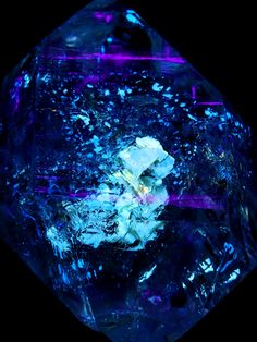 a blue diamond with purple highlights on it