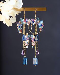 Welcome to visit my Jewelry store:  https://www.etsy.com/shop/Jeansdreamjewelry  Custom order accepted now. Feel free to ask me to see if it is possible. I would love to meet your requirements.  Made to order. Every item will come in a jewelry pouch for safety during travel and gift giving. These dangle earrings are handmade with all natural high quality and well selected gemstones. They are lightweight and comfortable to wear. All materials used are nickel free, friendly to sensitive skin.  🌷MEASUREMENTS Length: 8 cm including ear-wire Width: 2.3 cm 🌷GEMSTONE  🔹Kyanite  🔹Amethyst  🔹Tourmaline 🔹Aquamarine  🔹Freshwater Pearl 🔹Swarovski Crystal  🔹Cat Eye 🔹Czech Lead Glass 🔹Glass Beads  🌷MATERIALS 🔹14K gold filled ear wire, 14K gold filled wrapping wire, 14K gold filled chain 🌷H Czech Glass Earrings Handmade, Spring Jewelry Trends, Kyanite Jewelry, Handmade Jewelry Earrings, Spring Jewelry, Natural High, Jewelry Beads, Beaded Material, Butterfly Charm