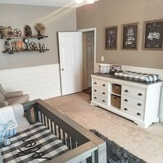 a baby's room is decorated in neutral colors