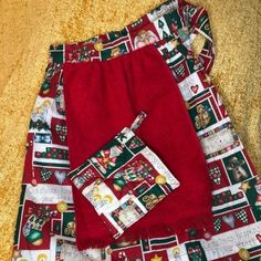 two pieces of red and green christmas fabric