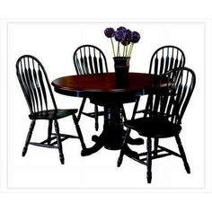 a dining table with four chairs and a flower vase on top of it, against a white background