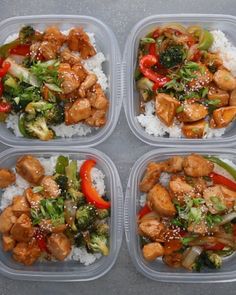 four plastic containers filled with chicken and veggies on top of rice covered in sesame seeds