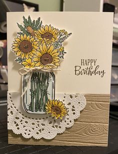 a birthday card with sunflowers in a mason jar