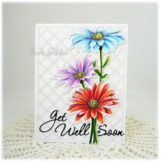 a card with flowers on it and the words get well soon