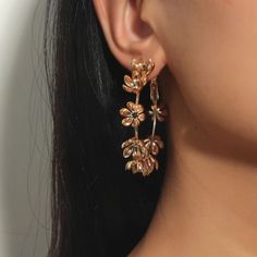 This Unique Pair Is A Wonderful Addition To A Wonderful Addition To Your Wardrobe And Your Style; Sure To Get Lots Of Compliments! Gsumpa50600jnd6 Gold Dangle Hoop Earrings For Spring, Gold Hoop Flower Earrings For Summer, Flower Shaped Hoop Earrings For Party, Elegant Summer Hoop Flower Earrings, Gold Hoop Flower Earrings For Party, Gold Flower Hoop Earrings For Spring, Summer Gold Hoop Flower Earrings, Metal Hoop Flower Earrings, Unique Gold Floral Earrings