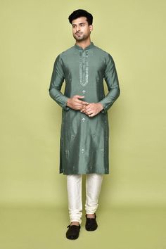 Green kurta with mirrorwork embellishments. Comes with churidar. - Aza Fashions Long Sleeve Kundan Kurta For Eid, Straight Churidar In Art Silk With Cutdana, Straight Kurta With Gota Work For Eid, Eid Traditional Wear Straight Kurta With Gota Work, Unstitched Gota Work Bandhgala For Diwali, Bollywood Style Bandhgala With Gota Work For Eid, Transitional Unstitched Churidar With Mirror Work, Eid Bollywood Bandhgala With Gota Work, Traditional Drape Kurta With Mirror Work For Eid