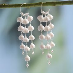 LOVCIA White Petal Cascading Floral Drop Chandelier Sterling Silver Earrings for Women Elevate your elegance with the exquisite LOVCIA White Petal Cascading Floral Drop Chandelier Sterling Silver Earrings for Women. These stunning earrings are designed to captivate and enchant, making them a perfect addition to your jewelry collection. Key Features: Material: Crafted from high-quality 925 sterling silver, ensuring durability and a timeless shine. Design: Featuring a cascading floral drop chandel White Long Drop Chandelier Earrings For Wedding, Delicate White Jewelry With Dangling Beads, Delicate White Dangle Chandelier Earrings, Delicate White Long Drop Bridal Earrings, White Long Drop Bridal Earrings, White Long Drop Pearl Chandelier Earrings, White Long Drop Chandelier Earrings With Dangling Beads, White Chandelier Earrings With Dangling Beads For Wedding, Wedding White Chandelier Earrings With Dangling Beads