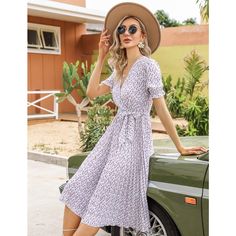 Step into summer with elegance in the WhizMax Women's Floral Wrap V-Neck Midi Dress. This charming dress is perfect for a variety of occasions, from beach outings to weddings, ensuring you look stylish wherever you go.

- Material: Soft, breathable fabric ideal for warm weather
- Features: Wrap V-neck, pleated details, short puff sleeves, elastic high waist, A-line silhouette, elegant hem, and includes a belt
- Color: Purple
- Size: 2XL
- Gender: Female

Designed with a flowy A-line cut and shor Chic V-neck Summer Dress For Vacation, White Summer V-neck Dress For Beach, Feminine White V-neck Beach Dress, Elegant V-neck Sundress For Brunch, Elegant V-neck Sundress For Day Out, Summer V-neck Knee-length Dress For Brunch, Feminine V-neck Midi Dress For Beach, Summer Midi Dress With Surplice Neckline For Vacation, V-neck Dress For Garden Party During Beach Season