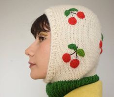 "\"Balaclava hand knit with crochet cherry\" 🍒 All my products are designed and knitted by myself. I choose the warmest and softest yarns for my balaclava collection. The white base is knitted and the cherries are crochet apliques. 🍒 I designed this \"Cherry balaclava\" for winter or cold spring days. It is perfect to use for skiing, snowboarding or daily walks in the city. It feels very soft and comfortable on the skin. You can make any every day fit very elegant with this balaclava. 🍒 You c Cold Spring, Knitted Hood, Soft Girl, Skull Cap Beanie, Spring Day, Soft Yarn, Hand Knitting, Winter Hats, Unique Designs