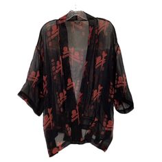 Embrace The Essence Of Asian Fashion With This Stunning Banjara Kimono. Made From 100% Silk Fabric, This Black Kimono Showcases A Beautiful Red Asian Print That Will Add Color And Vibrance To Any Outfit. The 27-Inch Length And Width Make It A Perfect Fit For Any Body Type, While The Shawl/Wrap Style Adds A Touch Of Elegance And Sophistication. The Garment Care For This Kimono Is Dry Clean Only, Ensuring Its Longevity And Keeping It Looking Brand New. Whether You're Dressing Up For A Special Occa Casual Black V-neck Kimono, Red Printed Kimono For Fall, Casual Red V-neck Kimono, Black Printed Kimono For Festival, Black One Size Kimono, Casual One Size Black Kimono, Casual Black One Size Kimono, Casual One-size Black Kimono, Casual Red Printed Kimono