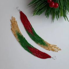 Red green gold fringe earrings Shoulder duster earrings Long | Etsy Handmade Red Beaded Earrings For Holiday, Holiday Red Handmade Beaded Earrings, Handmade Gold Beaded Earrings For Christmas, Bohemian Christmas Earrings For Festive Occasions, Handmade Red Jewelry For New Year, Red Tassel Earrings For Festive Occasions, Handmade Festive Drop Tassel Earrings, Handmade Bohemian Beaded Earrings For Christmas, Red Bohemian Earrings For Christmas