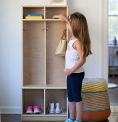 My First Cubby is a wooden locker offering cubbies, shelves, and 8 industrial grade hardware hooks. It provides all the nooks and crannies needed to help kids neatly store shoes, jackets, backpacks, and supplies. A small ledge provides a space to sit while putting on or removing shoes, encouraging kids to learn routines whenever they are heading out to their next activity or entering the home. Put one or more together for double the storage, and assign one section to each child to nurture organi Kids Backpack Storage, Minimize Clutter, Wooden Lockers, Playground Safety, Kids Cubbies, Learning Tower, Kids Closet Organization, Kid Closet, Book Storage