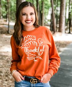 Gobble til you wobble this Thanksgiving in our Thankful Turkey Tee Shirt! This is the perfect festive tee for all your Thanksgiving activities!   * 6.0 oz., pre-shrunk 100% cotton* Double-needle stitched neckline and sleeves* Quarter-turned* Seamless seven-eighths inch collar* Taped neck and shoulders* Satin label* Rib cuffs Fun Fall Top With Letter Print, Fun Letter Print Tops For Fall, Fun Letter Print Top For Fall, Orange Screen Print Top For Fall, Casual Tops With Letter Print For Thanksgiving, Casual Letter Print Tops For Thanksgiving, Pre-shrunk Relaxed Fit Tops For Fall, Orange Crew Neck Top For Fans, Fall Cotton Tops Pre-shrunk