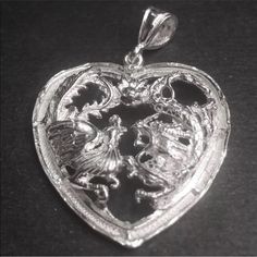 New Large Handcrafted 925 Silver Chinese Double Happiness For Wedding Dragon & Phoenix Heart Charm Pendant Metal : .925 Solid Silver Pendant Type : Dragon & Phoenix Heart Pendant Approximate Width : 1 . 2 7 “ Inches (3 2 . 3 Mm) Approximate Height : 1 . 3 3 “ Inches (3 3 . 8 Mm) Approximate Thickness : 0 . 0 6 “ Inches (1 . 7 Mm) Approximate Total Weight: 7 . 5 To 8 . 5 Grams Finish : Polish / Glossy Item # : Jn12101808-S-5098 Traditional Heart-shaped Jewelry For Weddings, Traditional Heart Jewelry For Wedding, Traditional Heart-shaped Wedding Jewelry, Engraved Heart Cut Jewelry For Wedding, White Gold Double Heart Wedding Jewelry, Heart Pendant Jewelry With Intricate Design For Wedding, Heart-shaped Jewelry With Intricate Design For Formal Occasions, Formal Heart-shaped Jewelry With Intricate Design, Traditional Heart Pendant Jewelry For Wedding