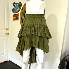 This Amazula Skirt Is New With Tags. It Features A Mid-Rise Waist And High-Low Trim. The Skirt Has Flair With Its Multi-Tiered Style. The Olive Hue Makes It Easy To Match With Neutral Or Metallic Tones. It Has A Flowy Bohemian Spanish Or Caribbean Vibe. Making Skirts, Olive Skirt, High Low, High & Low, Mid Rise, Womens Skirt, Trim, Skirt, Tags