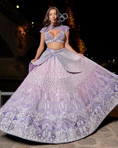 Purple Ombre Lehenga Set, a blend of elegance and artistry. Handcrafted with intricate hand embroidery, the linen satin lehenga radiates grace. Paired with a matching blouse and complemented by an ethereal organza dupattaFrom Jigar Nikita’s 11:11 In Paris collection DELIVERY TIMEPlease allow 8-12 weeks for your outfit to arrive. FABRIC DETAILSLehenga - Linen Silk, Blouse - Net & Linen Silk, Dupatta - Net Professional cleaning only. Lilac Lengha, Purple Lengha, Ombre Lehenga, Lavender Outfit, Purple Lehenga, Satin Lehenga, Purple Ombre, Silk Dupatta, 12 Weeks