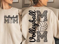 two women wearing matching shirts with volleyball mom on them