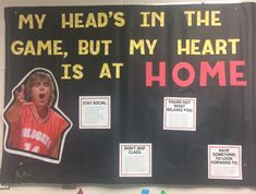 a bulletin board with pictures and words on it that says, my head's in the game, but my heart is at home