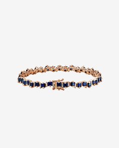 Experience the vibrant beauty of the 'Princess' Collection with this exquisite handcrafted 18-karat gold tennis bracelet from SUZANNE KALAN. Set with 7.80 carats of stunning princess cut dark blue sapphires, and alternating baguette white diamonds, this bracelet is a true masterpiece of luxury and sophistication. The timeless design of the bracelet makes it a versatile accessory that can be easily paired with any outfit, whether dressing up or dressing down. Details 18k white gold, yellow gold o Luxury Sapphire Tennis Bracelet, Luxury Sapphire Jubilee Bracelet, Formal Sapphire Jewelry With Baguette Diamonds, Timeless Blue Jewelry With Baguette Diamonds, Elegant Sapphire Jewelry With Baguette Diamonds, Classic Sapphire Jewelry With Baguette Diamonds, Luxury Sapphire Jewelry With Baguette Diamonds, Sapphire Tennis Bracelet, Gold Tennis Bracelet