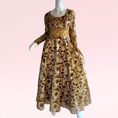 1970s Vintage Gold Lame metallic silk beaded rhinestone empire Dress. Glamorous and opulent shimmering golden gown. Exceptional vintage in  pristine condition and like new. Sustainable and one of a kind. Ready to wear fully lined. Size small  Chest 36 Waist 28 Hips 44 Length 59 Shimmering Metallic Empire Princess gown. Timeless iconic vintage design. Glamorous gorgeous exquisite party Gown https://www.Etsy.com/shop/SHANNONMYINDI free shipping us 70s Evening Gown, Gold Brocade Dress For Gala, Festive Gold Sequined Evening Dress, Glamorous Gold Silk Maxi Dress, Party Embellished Brocade Dress, Embellished Brocade Party Dress, Party Brocade Embellished Dresses, Brocade Embellished Party Dress, Embellished Brocade Dresses For Party