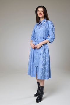 Sky Blue Petals Sleeved Shirt Dress  Embrace the charm of spring with this sky blue floral dress, blending timeless elegance with delicate petal patterns. Featuring long sleeves and a classic shirt collar, this versatile piece transitions effortlessly from day to night. The tailored fit flatters your figure, while the button-front closure adds ease and style.   Perfect for daytime outings or evening gatherings, pair this sky blue shirt dress with sandals for a breezy look or heels for a polished Spring A-line Silk Dress For Daywear, Elegant Blue A-line Shirt Dress, Spring Silk Midi Dress For Daywear, Spring Silk Dress For Dress Down Occasions, Silk Shirt Dress For Spring, Spring Casual Silk Dress, Spring Semi-formal A-line Dress, Semi-formal Spring A-line Dress, Semi-formal A-line Spring Dress