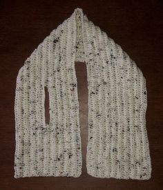 a knitted scarf with holes in the middle