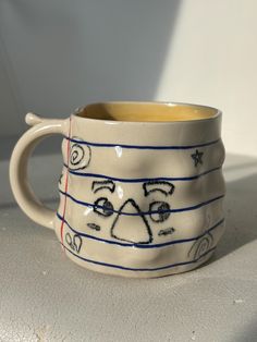 Drinking buddy to make you smile! Handmade ceramic slab mug that holds approx. 14 oz.  Microwave and dishwasher safe, but handwashing is preferred.  I hand-build all my pieces and freehand all their carvings so they are far from perfect, but that's how you know a person and not a machine has made them! Slab Mug, Ceramics Mug, Notebook Handmade, Drinking Buddies, Face Mug, New London, Hand Built, Handmade Ceramic