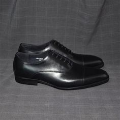 Crafted from cow leather, these slip-on dress shoes offer a smooth finish and easy wear, lined with comfortable pigskin, perfect for formal or business wear. Classic Leather Slip-on Shoes For Office, Fitted Slip-on Oxfords For Formal Occasions, Classic Pointed Toe Dress Shoes For Business, Classic Pointed Toe Business Dress Shoes, Semi-formal Oxfords With Almond Toe And Leather Lining, Elegant Wingtip Dress Shoes For Business Meetings, Semi-formal Plain Toe Loafers, Business Oxfords With Leather Sole And Almond Toe, Business Oxfords With Goodyear Welt And Almond Toe