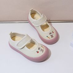 These adorable Mary Jane shoes feature an adorable cartoon design with a touch fastener strap. They offer arch support and have a soft heel insole for added comfort. Upper Material: CanvasOutsole Material: RubberLining Material: CanvasInsole Material: PU Suggested Age US Size EU Size FootLength Inch cm 2T 6 22 5.5 13.9 2T 7 23 5.7 14.4 2.5T 8 24 5.9 14.9 3T 9 25 6.1 15.4 3.5T 9.5 26 6.3 15.9 4T 10 27 6.5 16.4 5T 11 28 6.6 16.9 5T 11.5 29 6.8 17.4 5.5T 12.5 30 7 17.9 6T 13 31 7.2 18.4 6.5T 1 32 7 Soft Sole Mary Janes For Playtime, Spring Slip-on Mary Janes With Soft Sole, Pink Non-slip Canvas Shoes With Round Toe, Spring Mary Janes With Flat Heel, Medium Width, Spring Mary Janes With Removable Insole, Medium Width, Soft Heels, Mary Jane Shoes, Mary Jane Sneaker, Cartoon Design