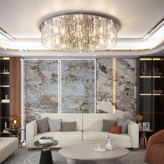 a living room with couches, tables and a chandelier hanging from the ceiling