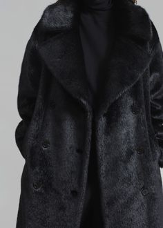 Color: Black Heavyweight faux fur fabric Oversized silhouette Maxi length Exaggerated notch lapel Drop shoulder Detachable matching belt Concealed side seam pockets Vented back Lined 100% Modacrylic Lining: 100% Polyester Dry Clean Only By The Frankie Shop. Imported Black Faux Fur Coat, The Frankie Shop, Frankie Shop, Fur Fabric, Faux Fur Fabric, Fur Fabrics, Oversized Silhouette, Faux Fur Coat, Drop Shoulder