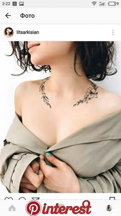 an image of a woman with tattoos on her chest