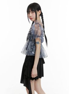 Product Detail Elevate your style with our KPOP-inspired women's fashion collection. Perfect for street and romantic looks, this crop top features shirring, frill, and see-through details. Ideal for festival occasions with a square neck and short sleeves. Style : Street, Romantic Occasion : Festival Detail : Shirring, Frill, See-through Material : Polyester, Rayon Sleeve : Short sleeve Neck : Square neck Length : Crop Fit : Normal fit Polyester 95 Rayon 5 Color : Blue Model Size Model is wearing Chic Short Sleeve Crop Top With Ruffles, Feminine Ruffled Short Sleeve Crop Top, Trendy Blue Mesh Top For Summer, Trendy Ruffled Short Sleeve Crop Top, Spring Ruffled Short Sleeve Crop Top, Trendy Short Sleeve Ruffled Crop Top, Sheer Crop Top For Spring Party, Sheer Sleeves Crop Top For Evening In Spring, Sheer Sleeve Crop Top For Spring Evening