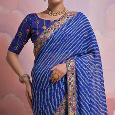 Blue colored saree is made from georgette fabric which is highlighted with beautiful printed work as shown. Comes along with unstitched mono silk blouse piece which you can customise as per your design/style. Occasion - You can wear this saree for party, functions and fashionista. Note:- the actual product may differ slightly in color and design from the one illustrated in the images when compared with computer or mobile screen. Measurements: Saree : Georgette : 5.5 Mtrs Blouse : Georgette : 0.8 Blue Georgette Pre-draped Saree With Pallu, Blue Pre-draped Saree With Unstitched Blouse For Festivals, Multicolor Georgette Blouse Piece For Eid, Designer Blue Bandhani Print Choli, Blue Georgette Pre-draped Saree With Self Design, Blue Unstitched Saree With Printed Border, Blue Semi-stitched Saree With Printed Border, Semi-stitched Blue Saree With Printed Border, Blue Saree With Printed Border