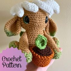 a crocheted stuffed animal holding a carrot in it's hand with the words crochet pattern above it