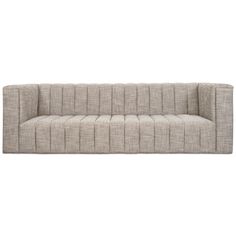 a beige couch with pleated upholstered back and arms, facing the camera